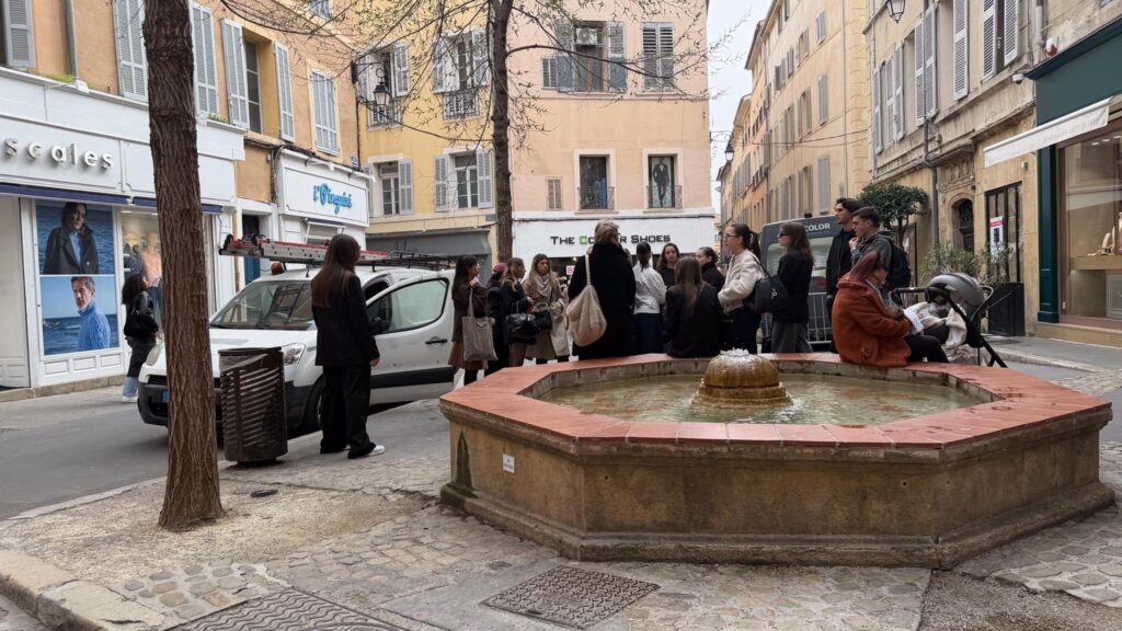 Grouped next to a fountain 