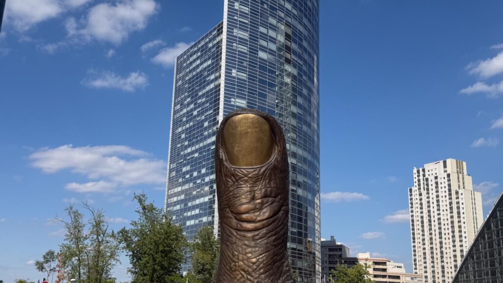 Giant bronze thumb